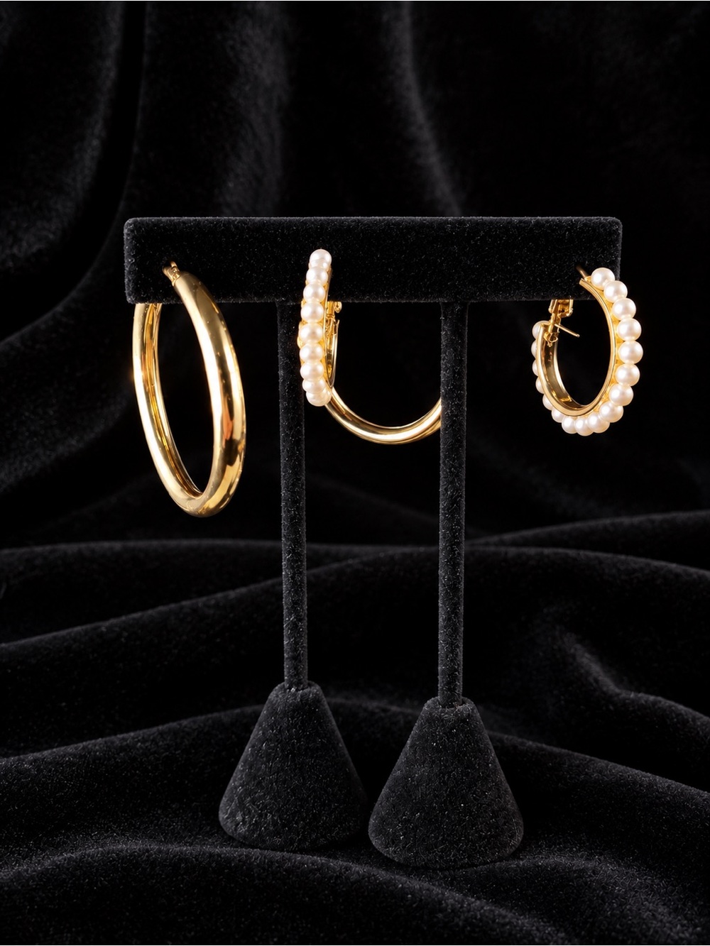 Two Pairs of Hoop Earrings One Gold Hoop One Pearl Hoop
